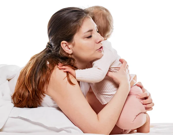 Embracing mother and baby — Stock Photo, Image