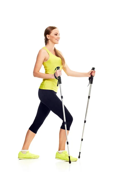 Nordic Walking schlanke Frau volle Länge — Stockfoto