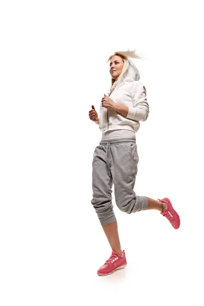 Loper fitness vrouw in beweging — Stockfoto
