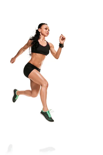 Female athlete jumping — Stock Photo, Image