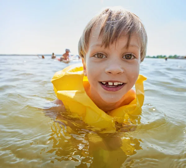 Little boy swimming. summertime — Stock Photo, Image