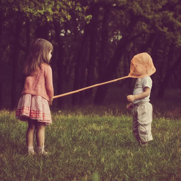 Children catching butterflies — Stock Photo, Image