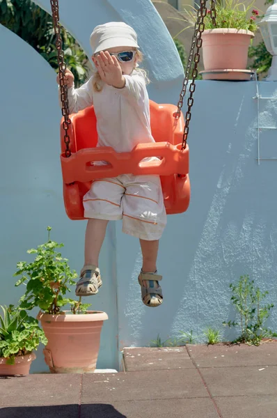 Little boy on swing — Stock Photo, Image