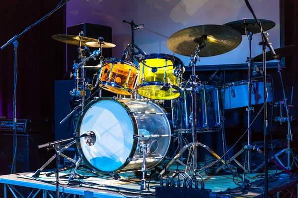 Colored drums on the stage of a concert in a club