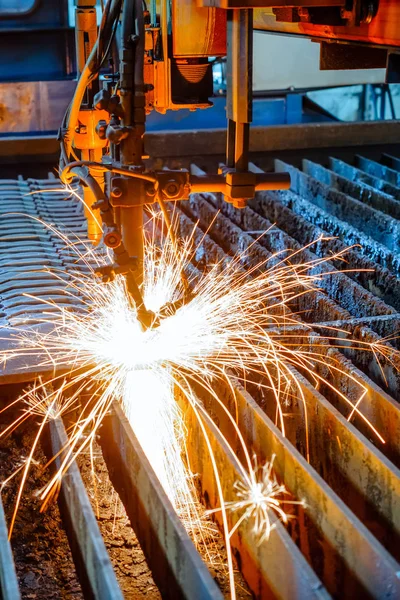 Oxygen torch cuts steel sheet.