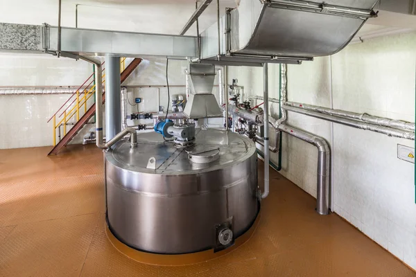 Stainless steel tanks for mixing liquid.