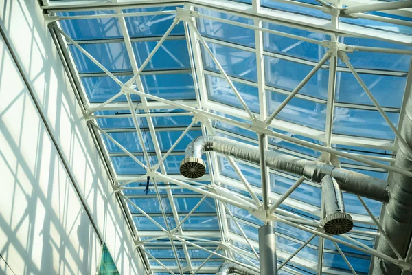Glass roof consisting of double-glazed windows and metal structures.