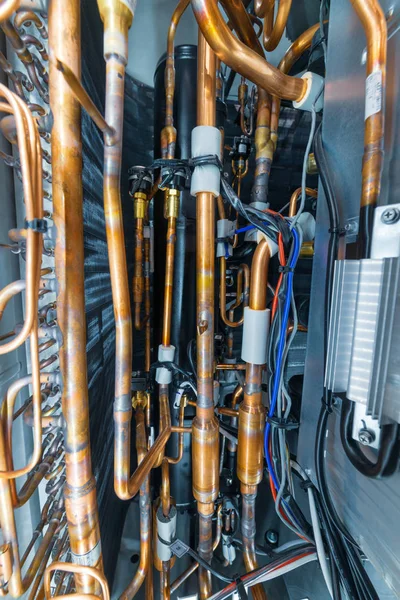 Internal arrangement of the industrial air conditioner. Many copper brazed tubes.