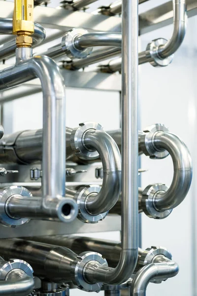 Industrial stainless steel piping connected by special nuts