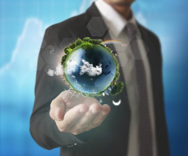 Küre, dünya insan elinde parlayan bizim seyyare yerküre tutan el