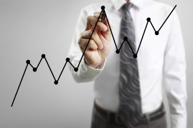 İşadamı grafik büyüyen grafik çizim