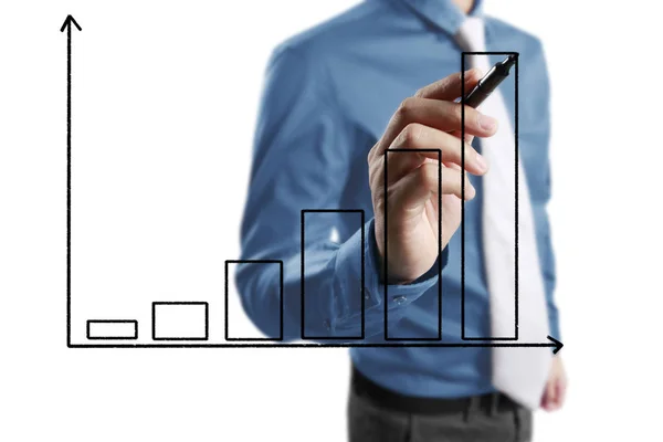 Business man drawing growing graph — стоковое фото