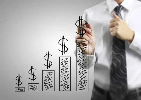 Businessman drawing   growing graph — Stock Photo, Image