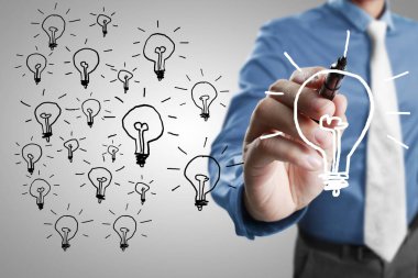 ampul Beyaz tahtada çizim işadamı