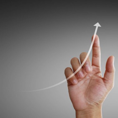 Finansal sembolleri olan bir iş adamı geliyor.