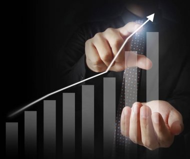 Finansal sembolleri olan bir iş adamı geliyor.