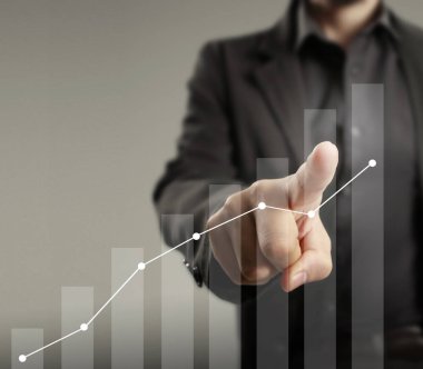 Finansal sembolleri olan bir iş adamı geliyor.