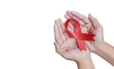 Sağlık ve tıp görevlileri kurdele tutuyor.