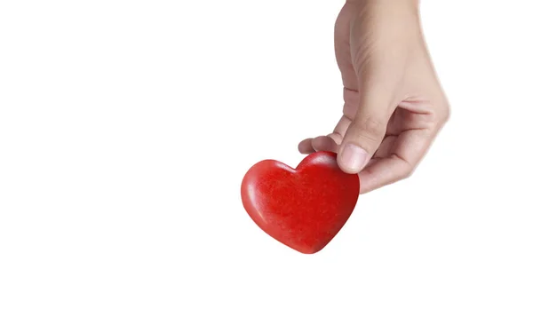 Mani con un cuore rosso, salute del cuore — Foto Stock