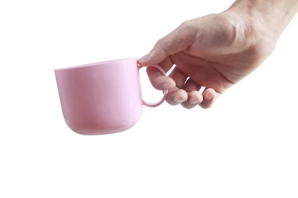 Main tenant une tasse en plastique comme un coulage — Photo
