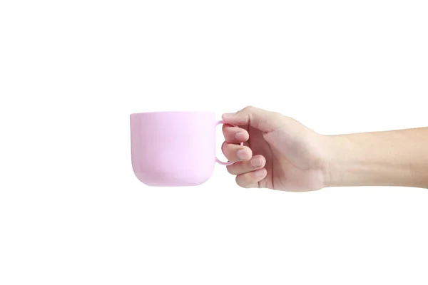 Mano sosteniendo la taza de plástico como un vertido — Foto de Stock