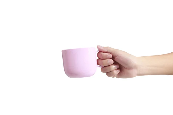 Mano sosteniendo la taza de plástico como un vertido — Foto de Stock