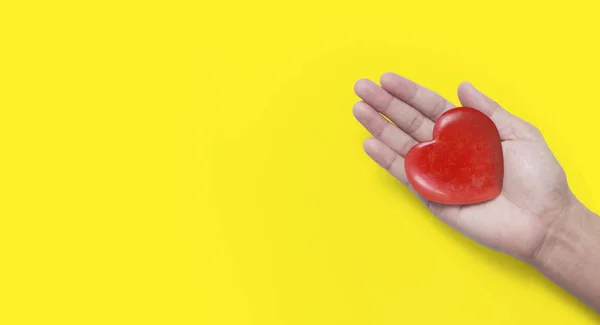 Hands holding a red heart .health donation concepts — Stock Photo, Image