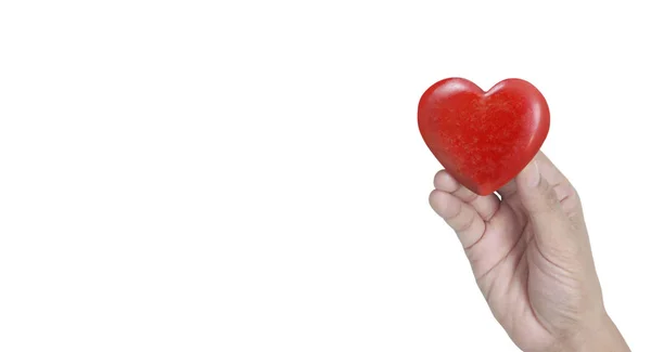 Manos sosteniendo un corazón rojo .health conceptos de donación — Foto de Stock