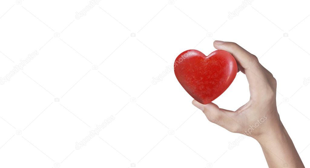 Hands holding a red heart .health donation concepts