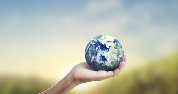 Globe ,earth in human hand, holding our planet glowing — 스톡 사진