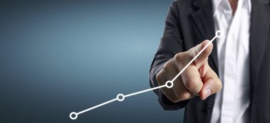 Finansal gösterge muhasebe pazarının grafiklerine elle dokunmak 