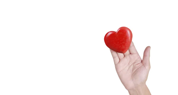 Mani con cuore rosso, salute del cuore e concetti di donazione — Foto Stock