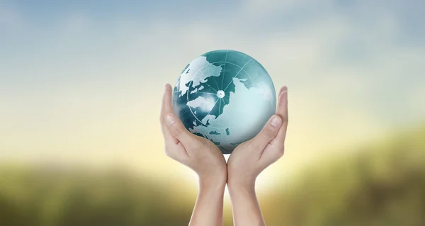 Globe ,earth in human hand, holding our planet glowing — Stock Photo, Image