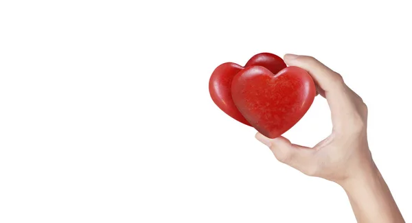 Manos sosteniendo conceptos de corazón rojo, salud del corazón y donación — Foto de Stock