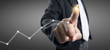 Finansal gösterge ve muhasebe piyasa analizi grafiklerine elle dokunmak