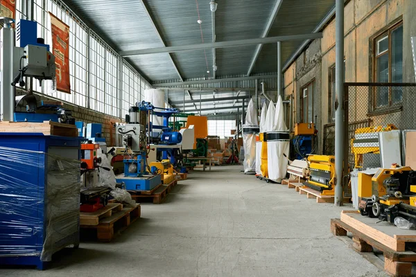 Background image of empty workshop on industrial factory, rows of machine units with copy space