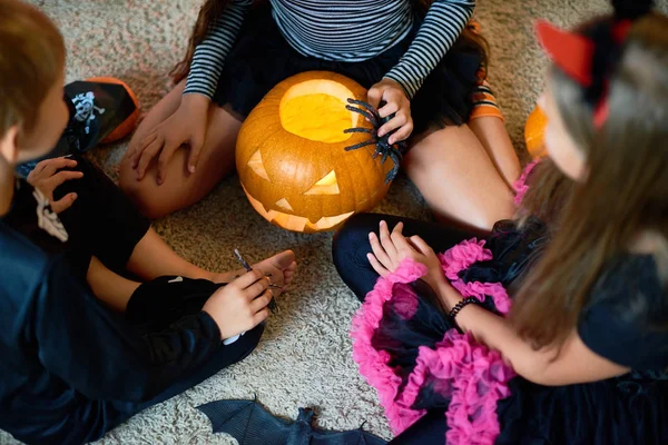 View Three Children Wearing Halloween Costumes Playing Magic Ritual Pumpkin — Stock Photo, Image