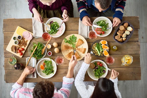 Top View Four Friends Eating Festive Dinner Table Delicious Food — Stock Photo, Image
