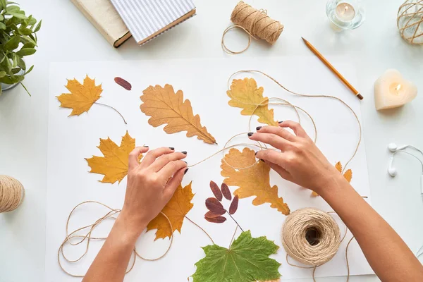 Top View Female Hands Making Handmade Autumn Leaves Decoration Interior — Stock Photo, Image