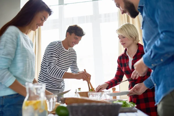 Group Young People Preparing Dinner Festive Celebration Standing Big Table — Stock Photo, Image