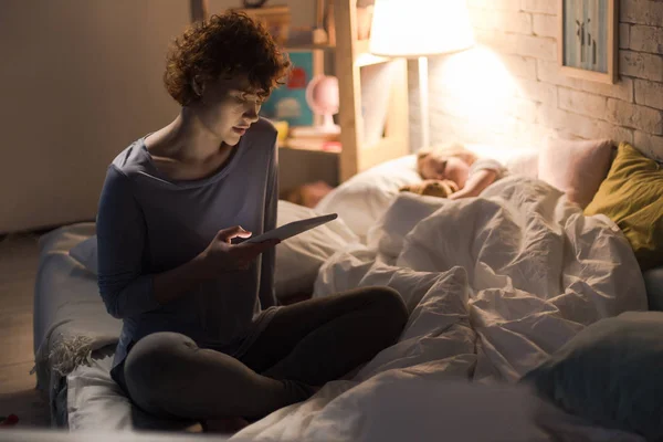 Full Length Portrait Young Woman Sitting Bed Reading Bedtime Story — Stock Photo, Image