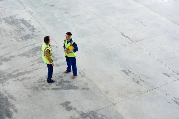 Diretamente Acima Vista Trabalhadores Construção Sexo Feminino Graves Colete Verde — Fotografia de Stock