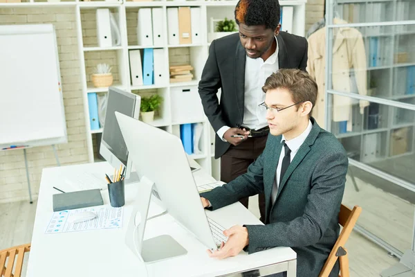 Portrait Two Successful Businessmen One Them African American Looking Computer — Stock Photo, Image