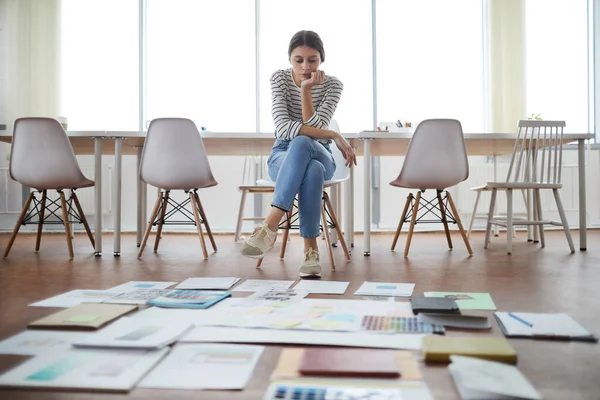 Full Length Portrait Young Woman Looking Documents Scattered Floor Office — Stock Photo, Image