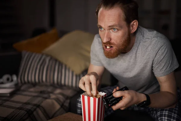 Portrait Bearded Adult Man Watching Dark Eating Pop Corn While — 스톡 사진