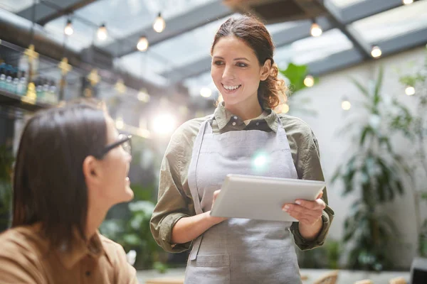 Waist Portrait Young Waitress Holding Digital Tablet While Taking Order — 스톡 사진