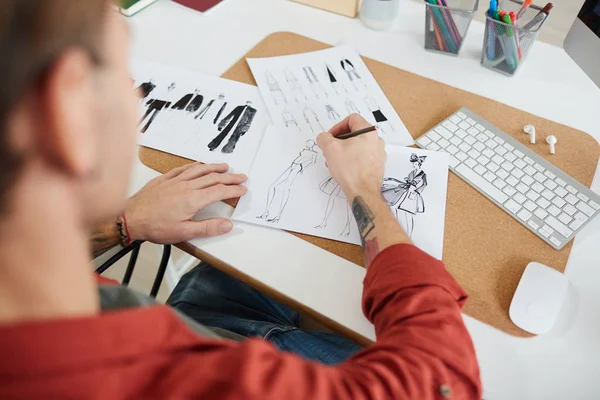 High Angle View Tattooed Male Fashion Designer Drawing Sketches Workplace — Stock Photo, Image