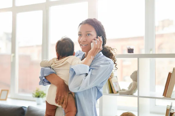 Waist Portrait Young African American Mother Speaking Phone While Holding — ストック写真