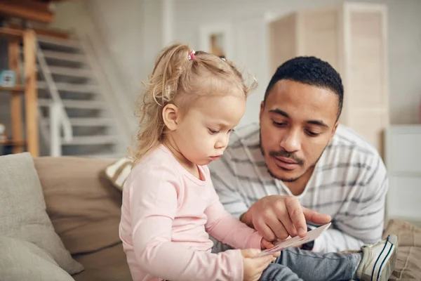 Portrait Caring Young Father Looking Pictures While Playing Cute Little — ストック写真