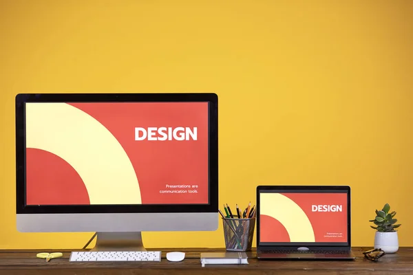 Designers Workplace Two Computer Screens Wooden Desk Pale Yellow Background — 图库照片